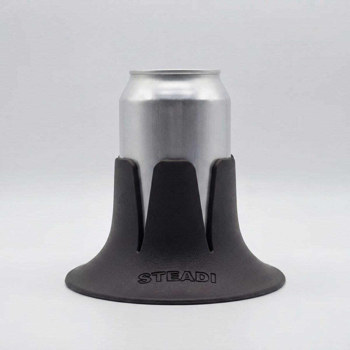 A can standing in a charcoal Steadi on a plain white ground.